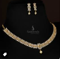 Classic Pearl & Gold Arc Necklace